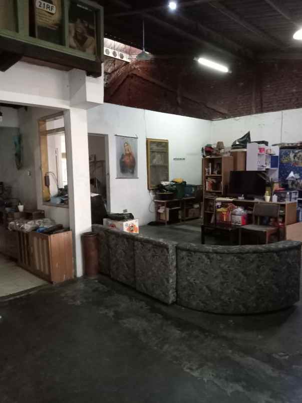 rumah letter l strategis di wisma permai