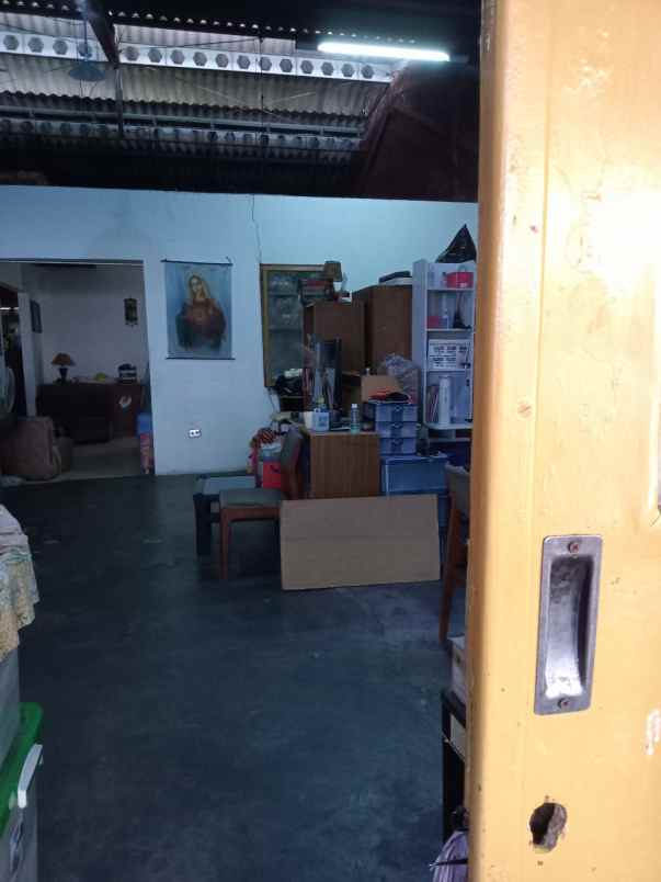 rumah letter l strategis di wisma permai