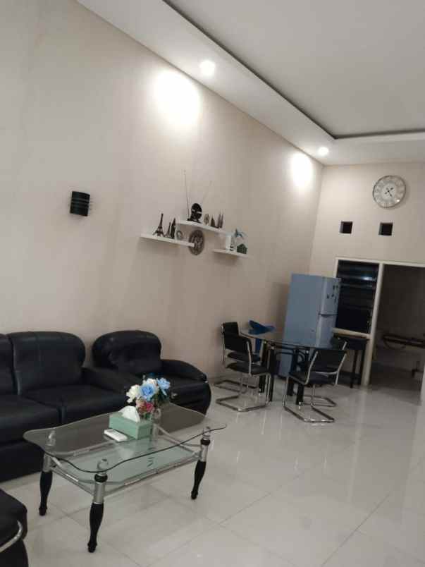 rumah pakuwon city puri asri minimalis strategis