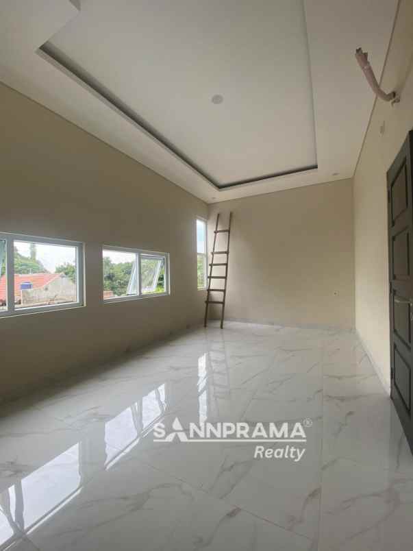 2 lantai 2 carport dalam cluster dekat tol limo rn