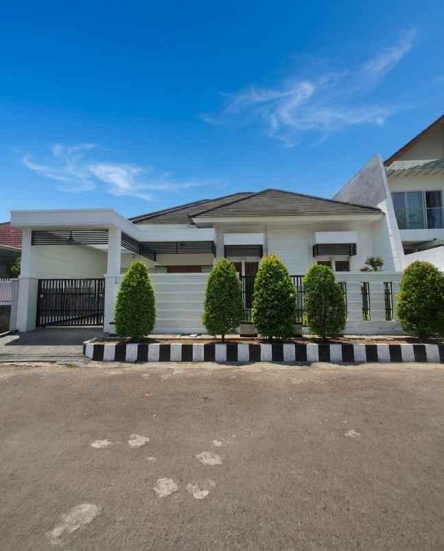 dijual rumah dharmahusada indah