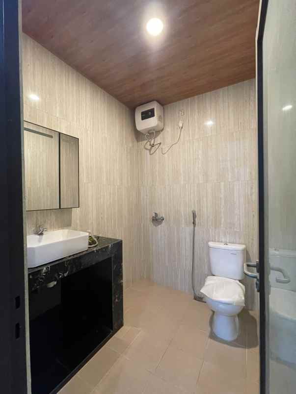 dijual rumah dharmahusada permai