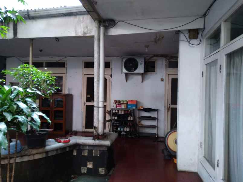 dijual rumah jalan raya pos pengumben