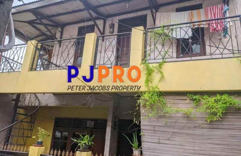 dijual rumah kampung sumur