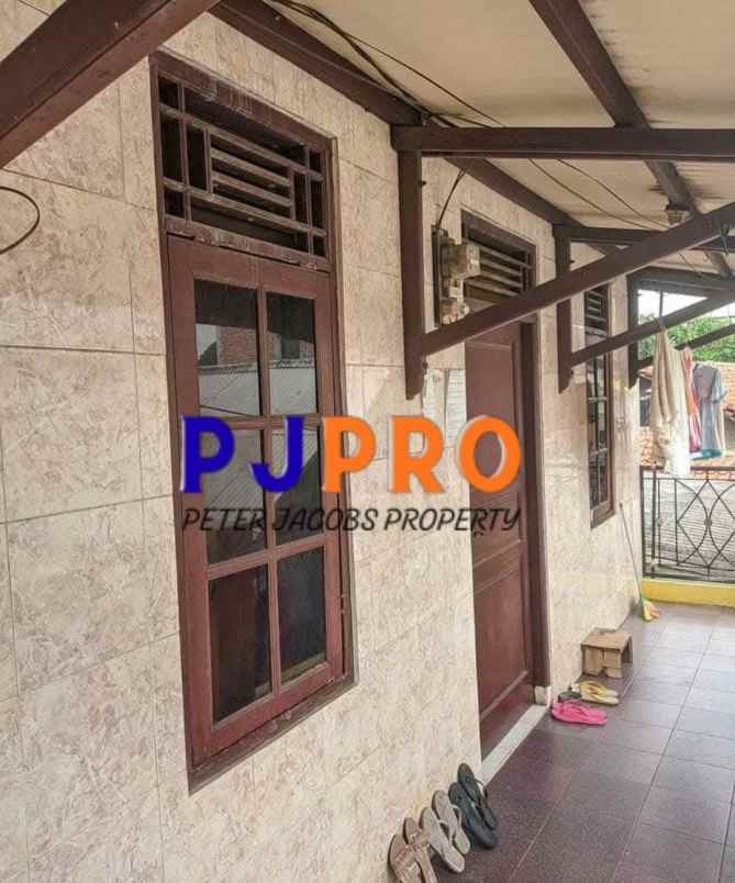 dijual rumah kampung sumur