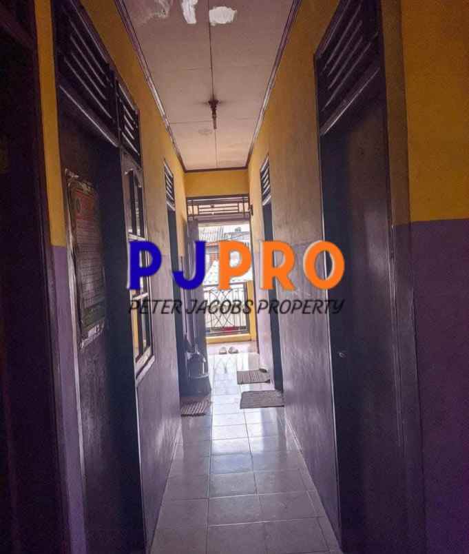 dijual rumah kampung sumur