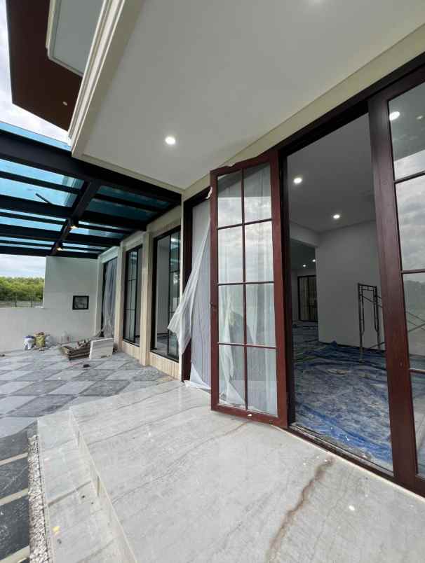 dijual rumah pakuwon city grand island