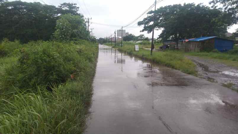 dijual tanah jalan raya tirtamulya