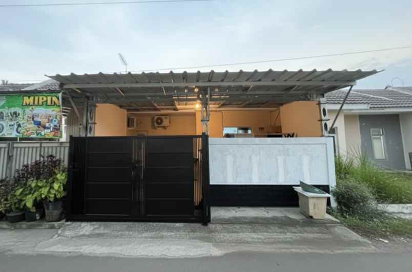 over kredit perumahan puri sava gelam serang