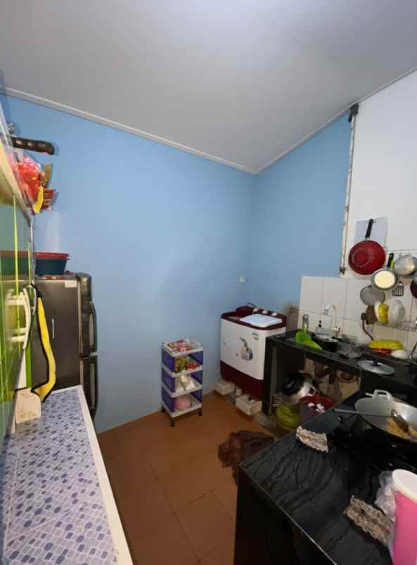 over kredit perumahan puri sava gelam serang