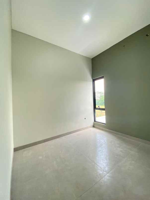 rumah 2 lantai bergaya bali industrial di tapos depok