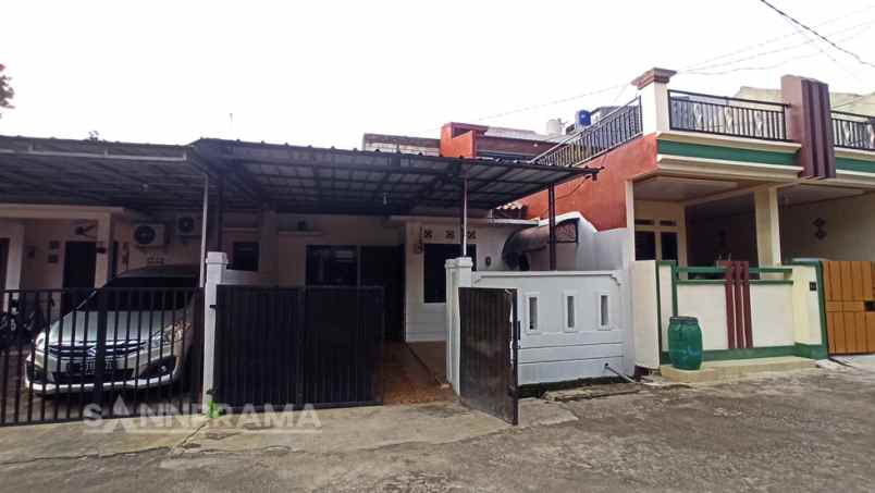 rumah jln raya krukut tanah baru