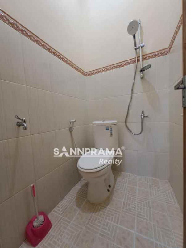 rumah luas 2 lantai beji timur bbgrin
