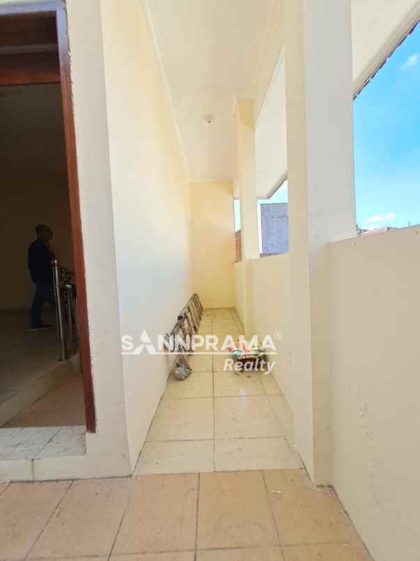 rumah luas 2 lantai beji timur bbgrin
