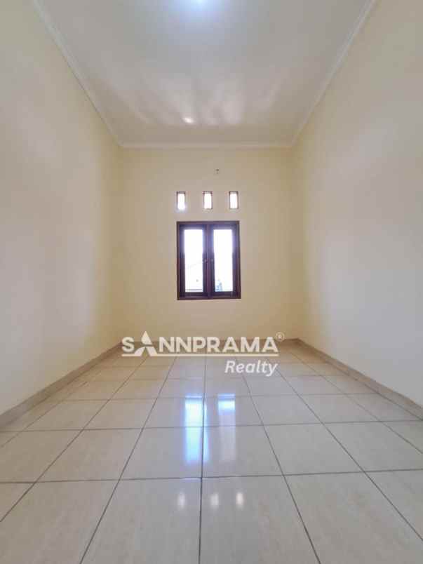rumah luas 2 lantai beji timur bbgrin