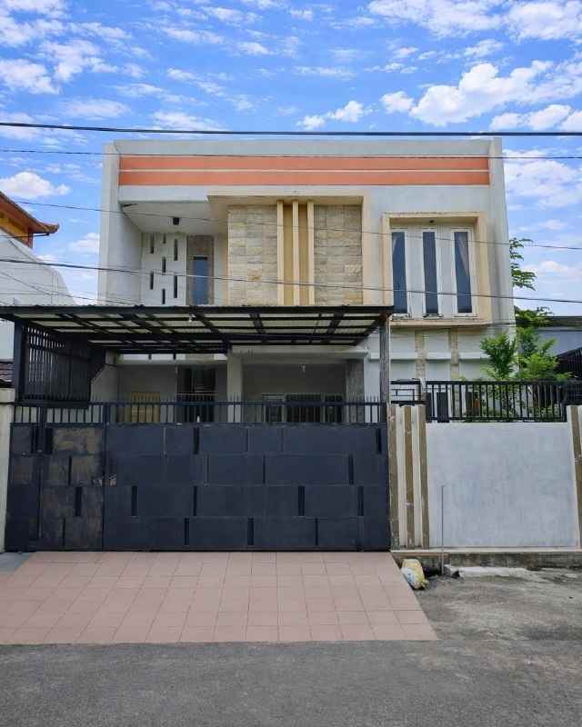 rumah wisma permai tengah strategis