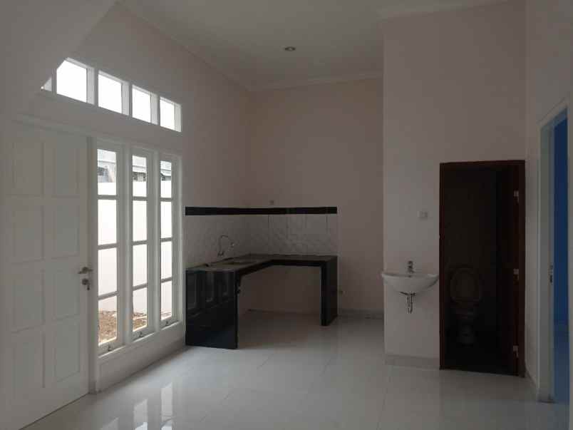 ahzavi rumah 2 lantai dekat gt jatiwarna