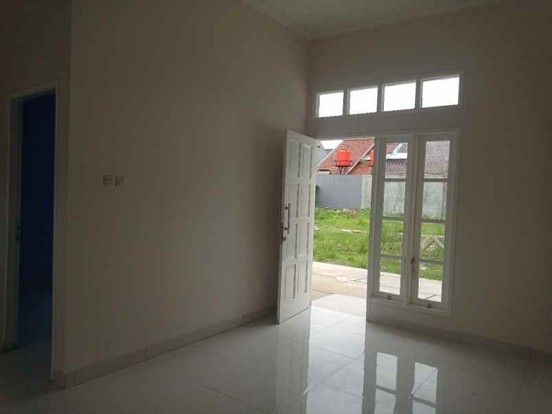 ahzavi rumah 2 lantai dekat gt jatiwarna