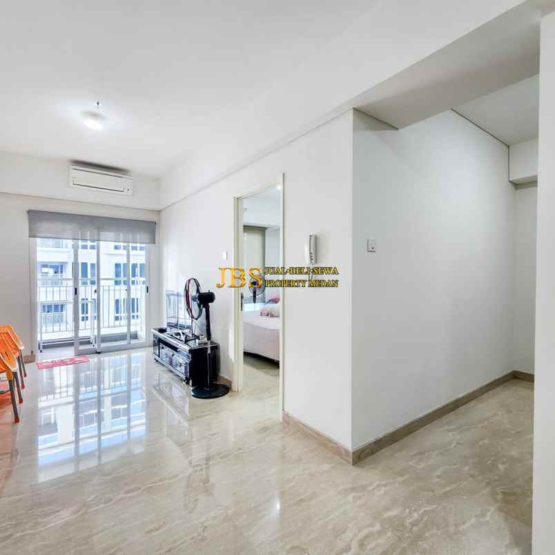 dijual apartemen podomoro city deli tower