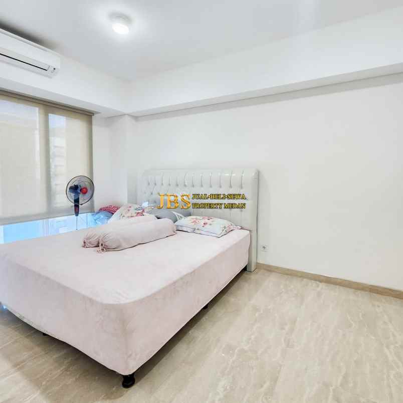 dijual apartemen podomoro city deli tower