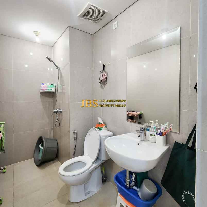 dijual apartemen podomoro city deli tower