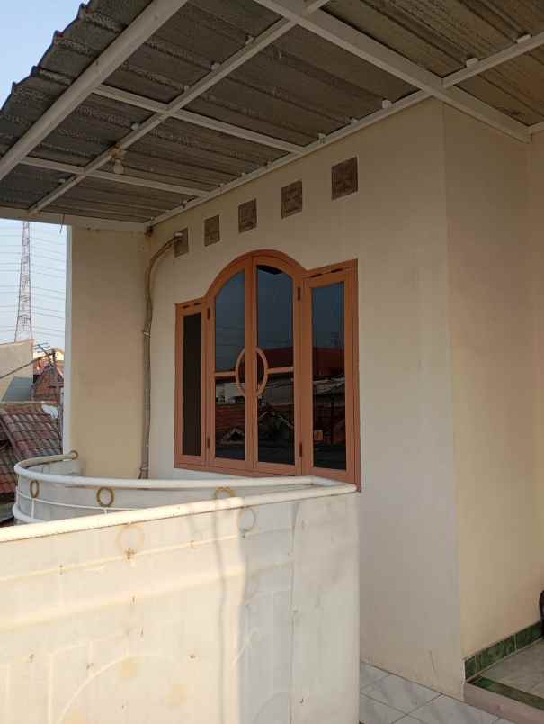 dijual rumah di taman harapan baru thb bekasi