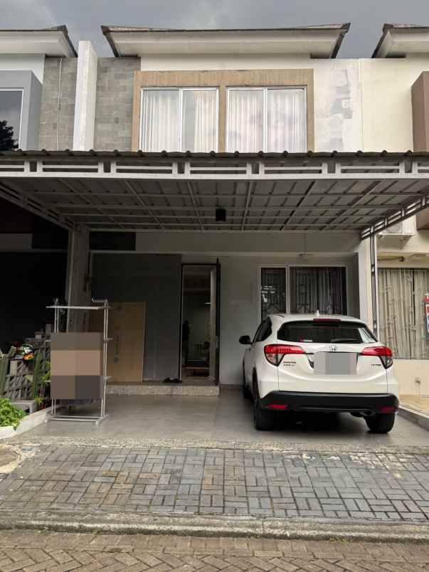 dijual rumah graha raya fortune