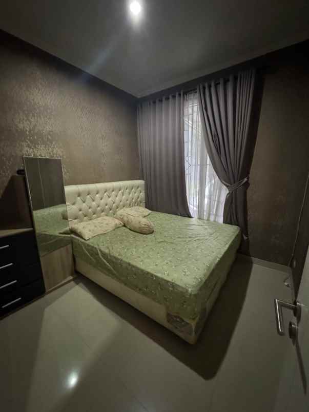 dijual rumah graha raya fortune