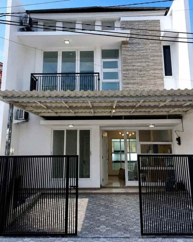 dijual rumah griya asri pakuwon city
