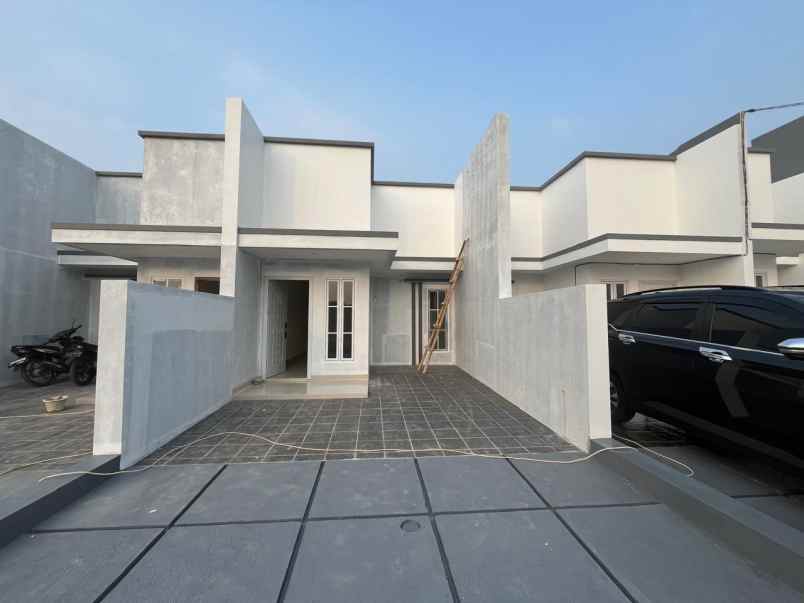 dijual rumah jalan raya benda baru