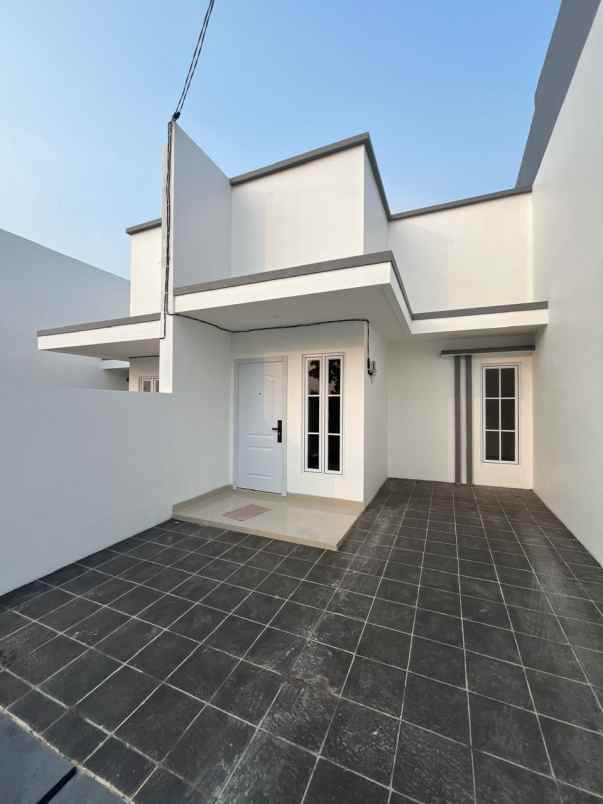 dijual rumah jalan raya benda baru