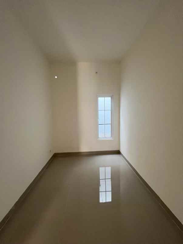 dijual rumah jalan raya benda baru