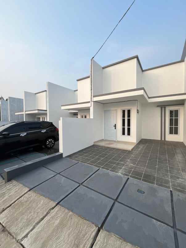 dijual rumah jalan raya benda baru