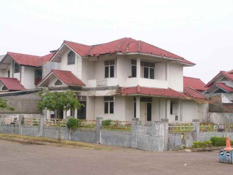 dijual rumah jl anggrek loka graha raya