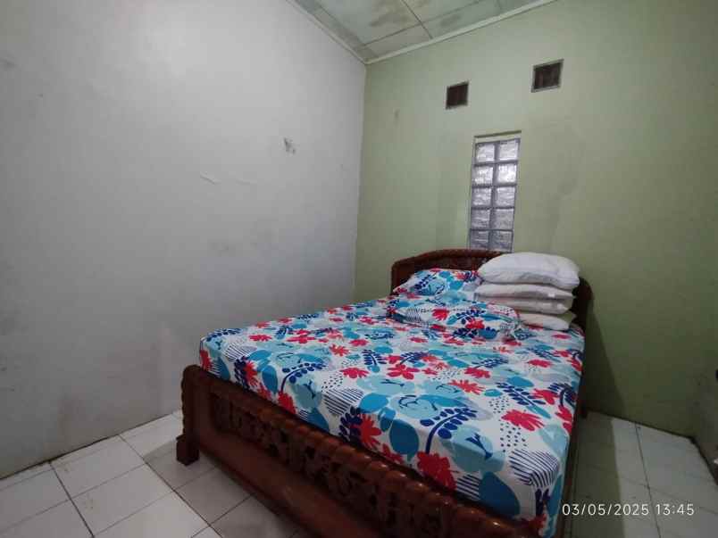 dijual rumah komplek bumi adipura