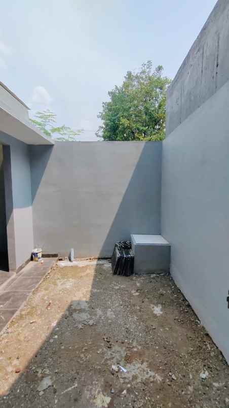 dijual rumah komplek bumi puspitek asri