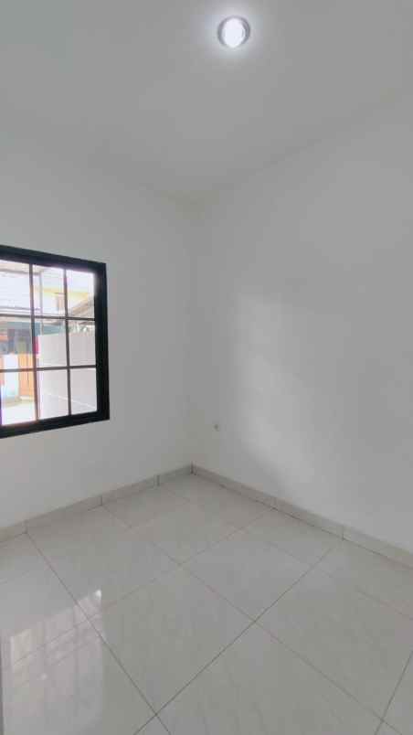 dijual rumah komplek bumi puspitek asri