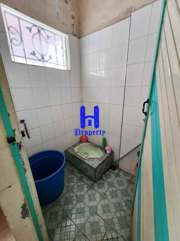 dijual rumah komplek griya riatur jalan