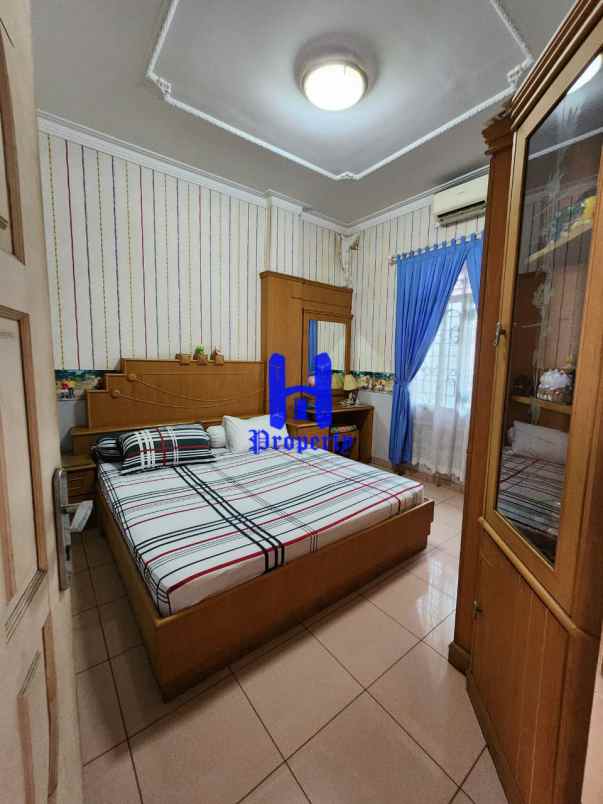 dijual rumah komplek griya riatur jalan