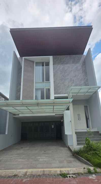 dijual rumah pakuwon city grand island