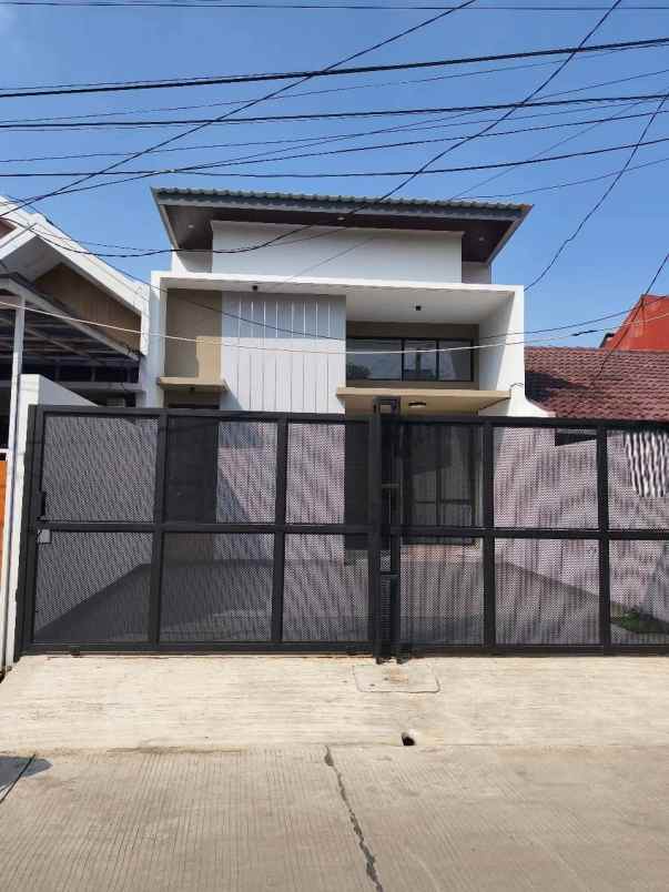 dijual rumah taman harapan baru kota