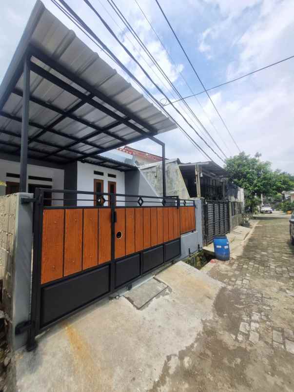rumah baru dalam perumahan dekat stasiun ka