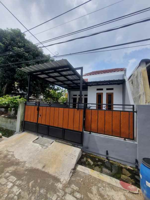 rumah baru dalam perumahan dekat stasiun ka