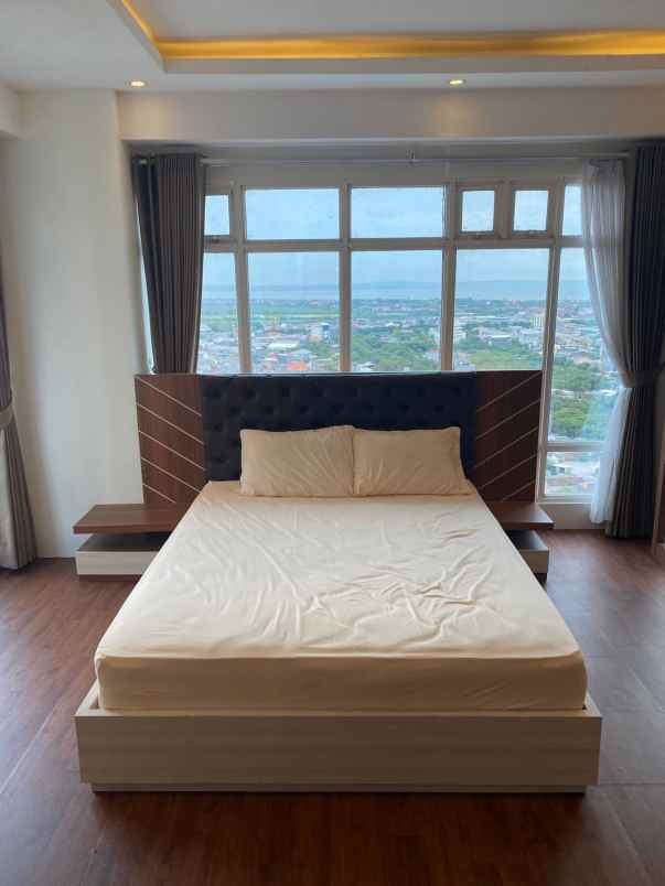 apartemen puncak dharmahusada tower b