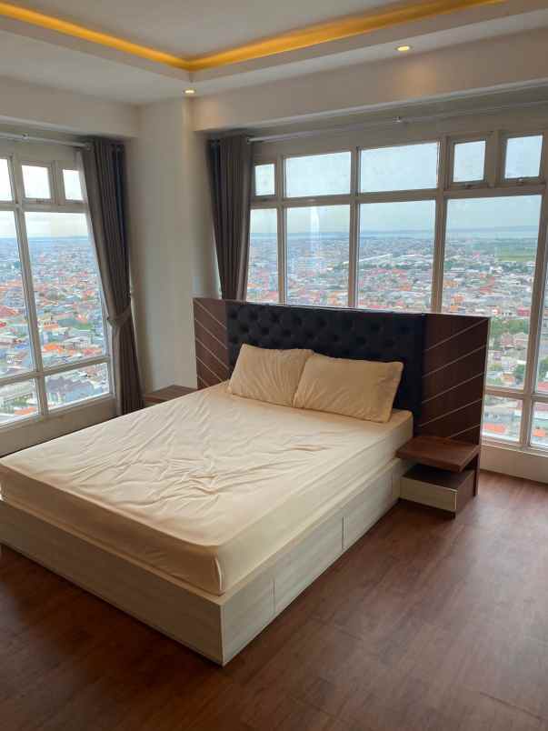 apartemen puncak dharmahusada tower b