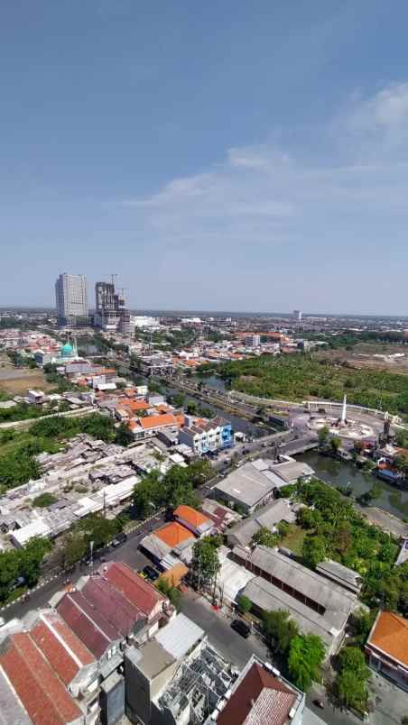 apartment grand dharmahusada lagoon lt 21 view city