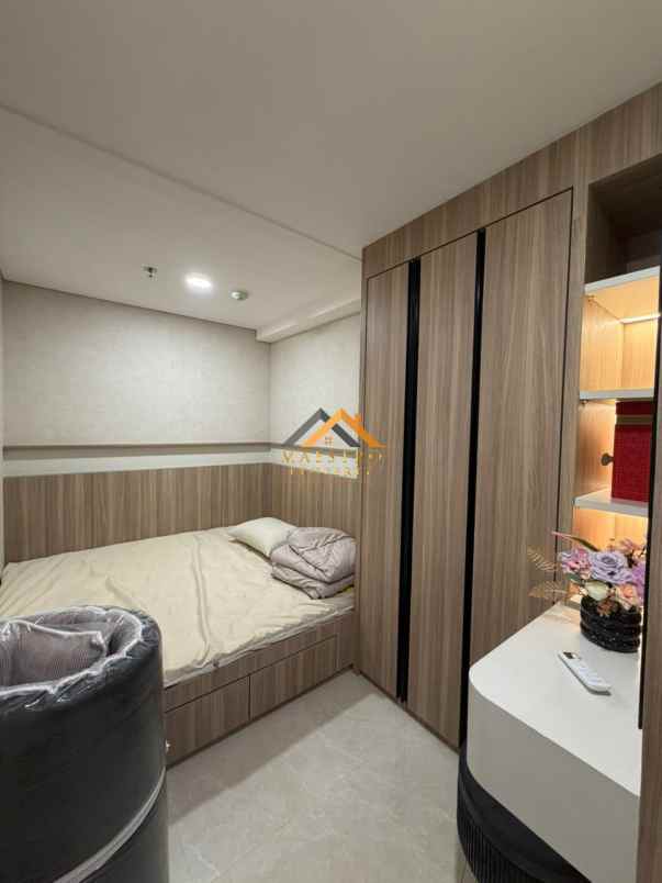 dijual apartemen podomoro city deli tower