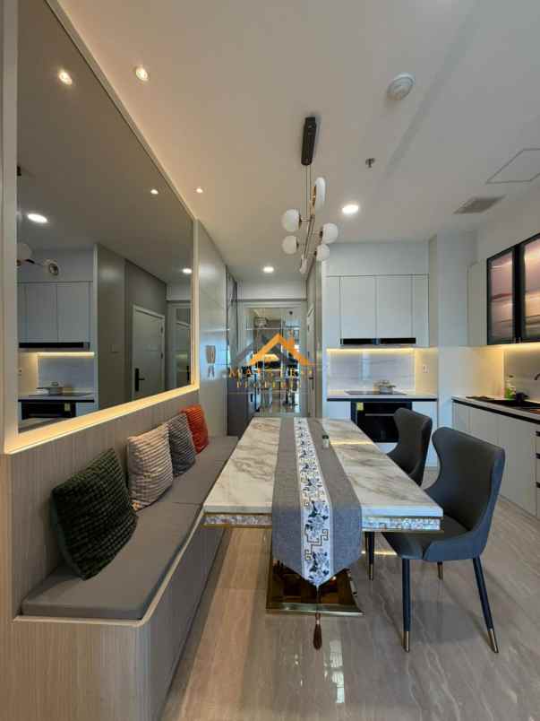 dijual apartemen podomoro city deli tower