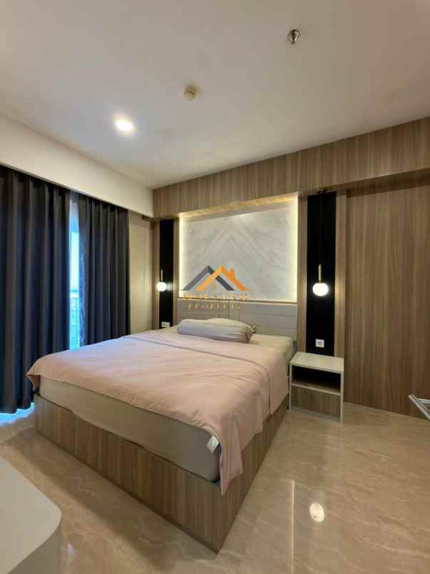 dijual apartemen podomoro city deli tower