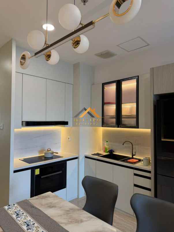 dijual apartemen podomoro city deli tower